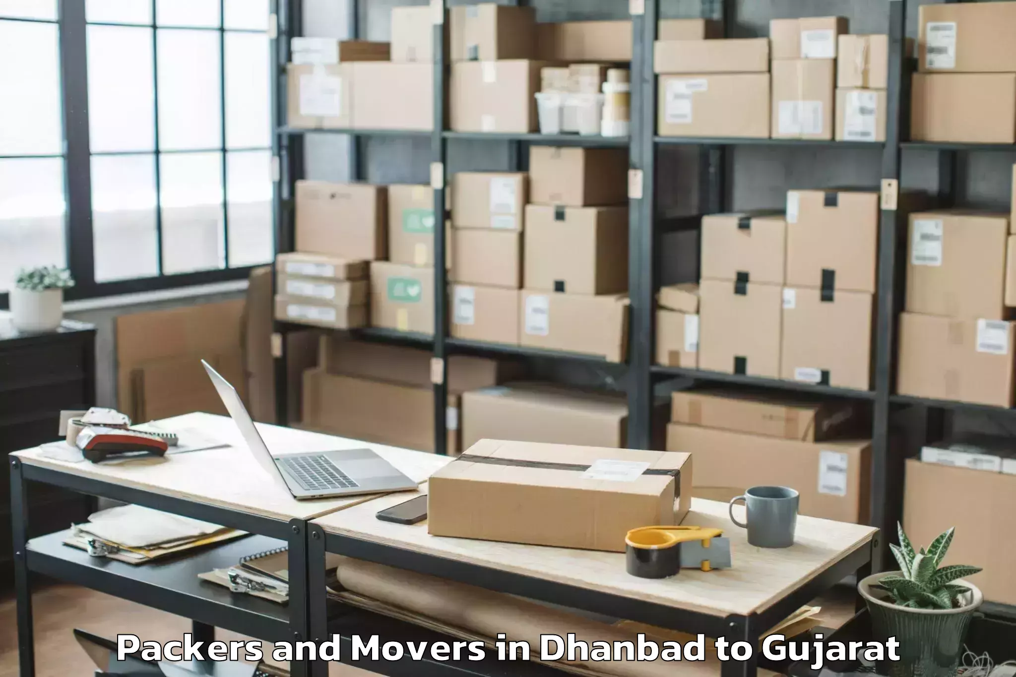 Reliable Dhanbad to Rudra Mata Airport Bhj Packers And Movers